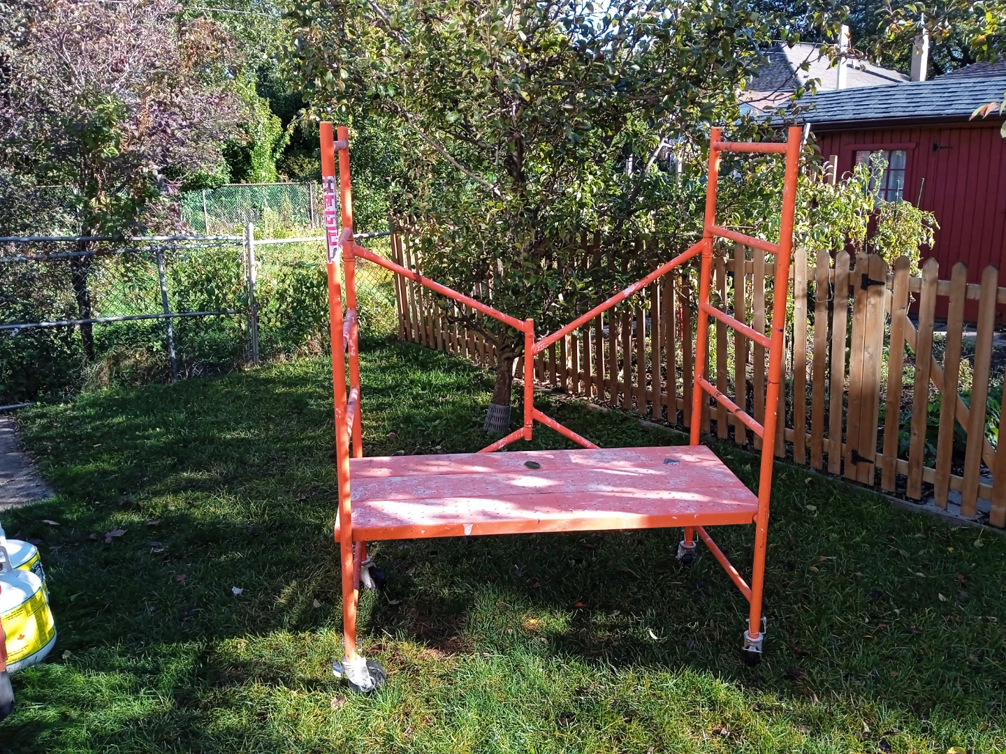 Orange metal rolling scaffold - photo 3