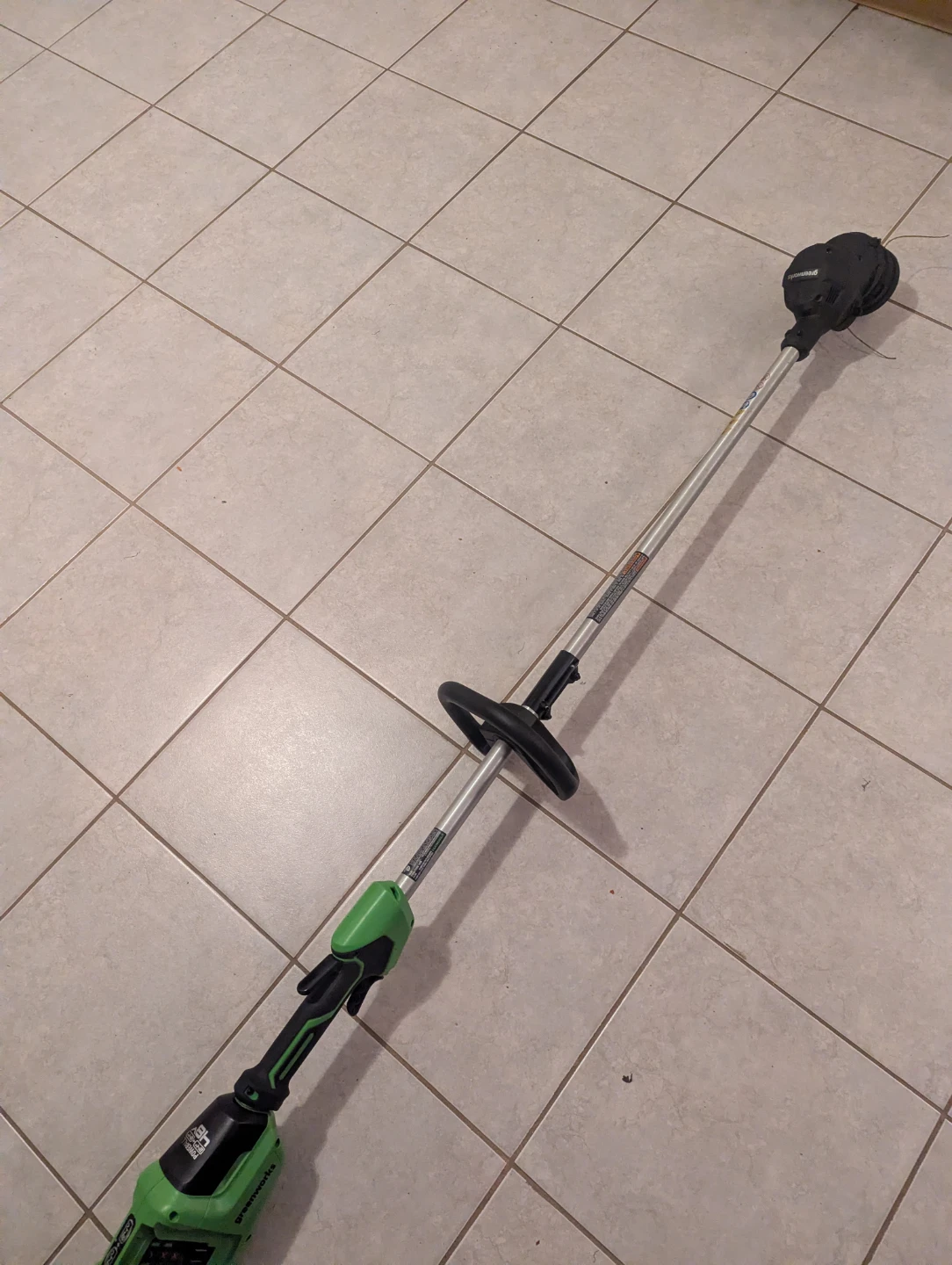 Greenworks 48v 15 inch  bump feed  trimmer like new