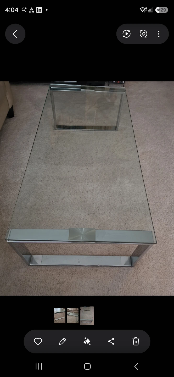 Modern sturdy glass top coffee table with polished chome legs