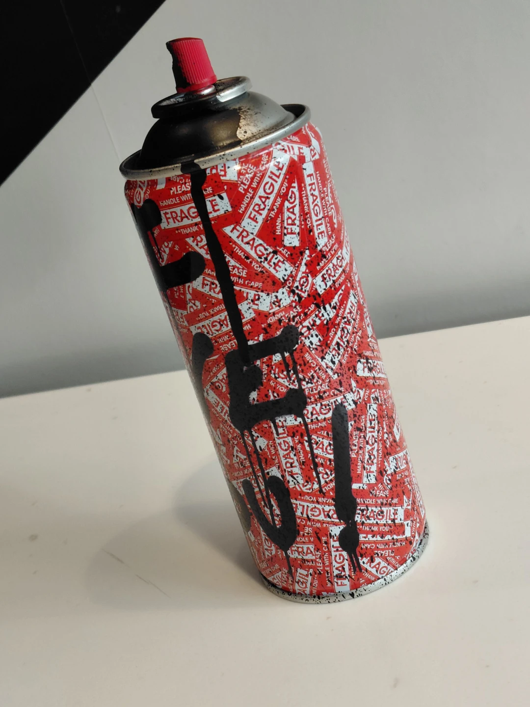 Mr,Brainwash limited with thumbprint graffiti artwork spray-can.