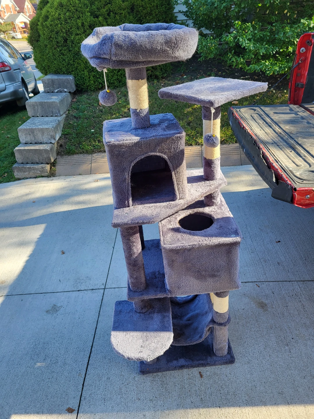 Grey multi-level cat tree with scratching posts