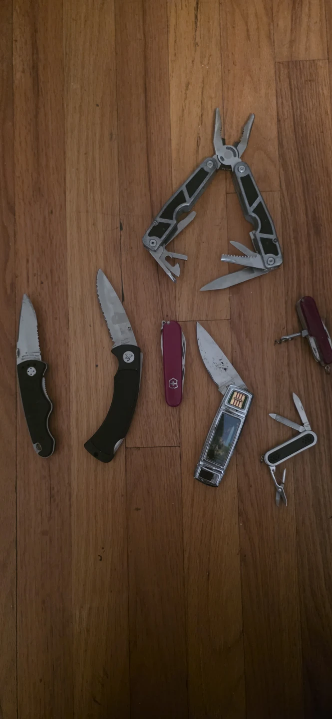 Assorted Multi-Tools and Pocket Knives