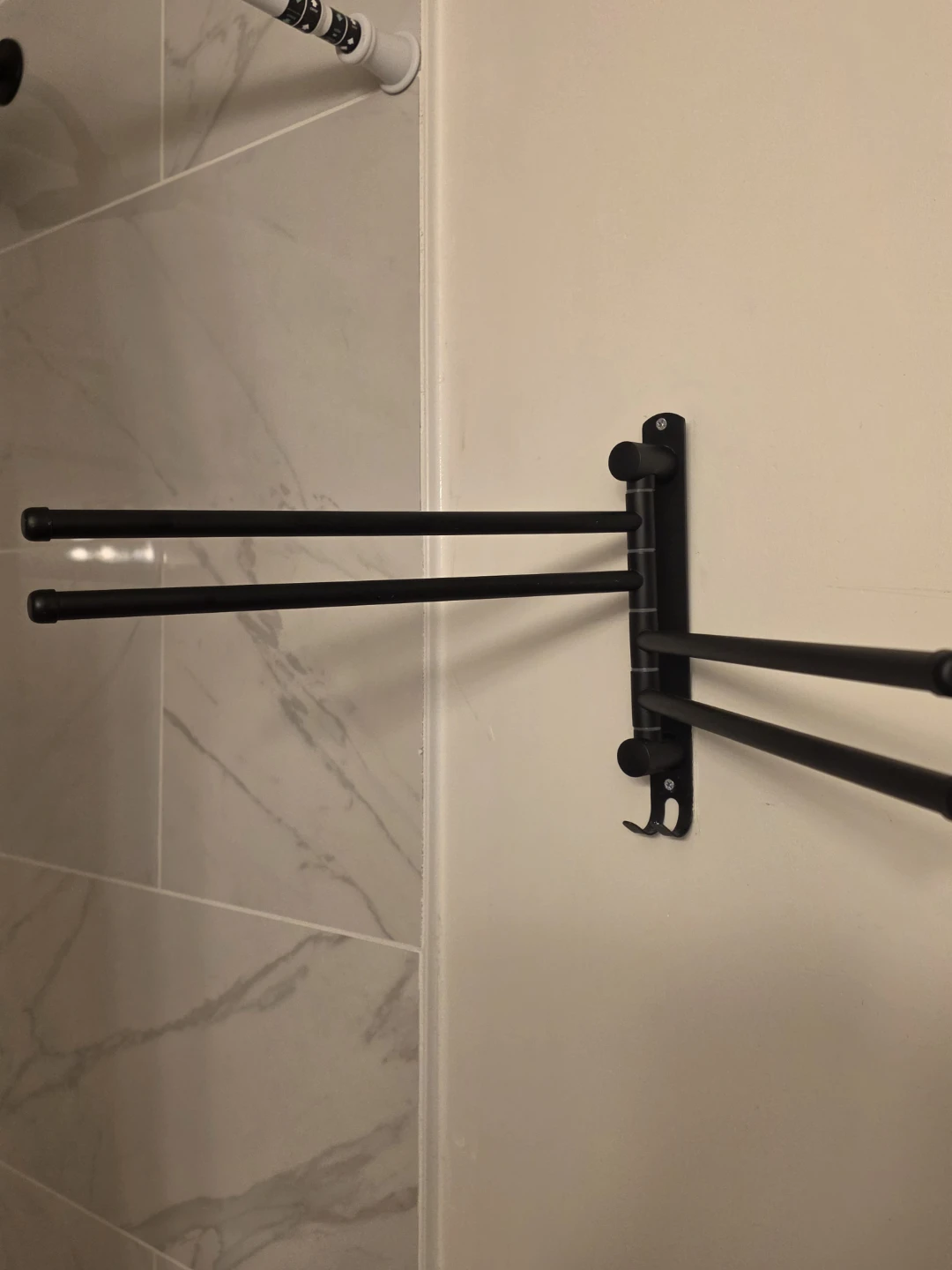 Black Rotating Wall-Mount Towel Rack