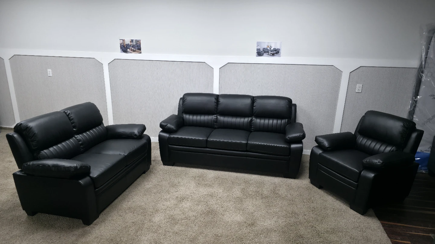 Brand new Grey leather set, sofa Loveseat chair. All for 990.