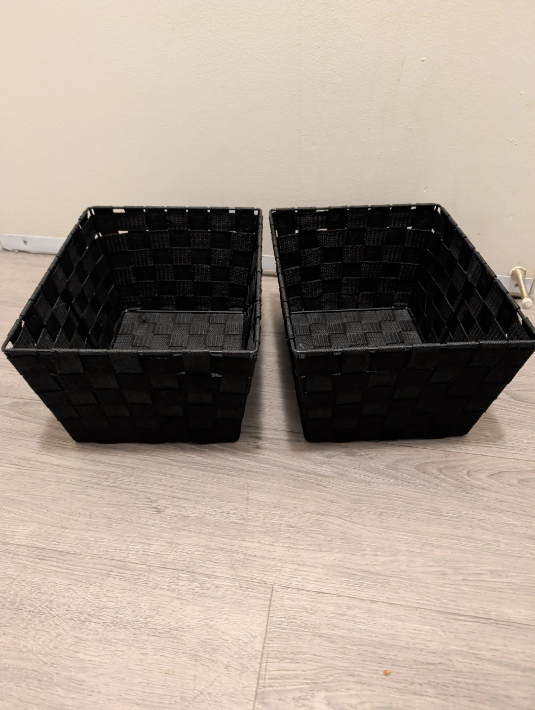 Two Black Woven Storage Baskets