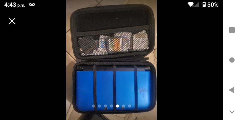 Nintendo 3DS Console with Games and Carrying Case