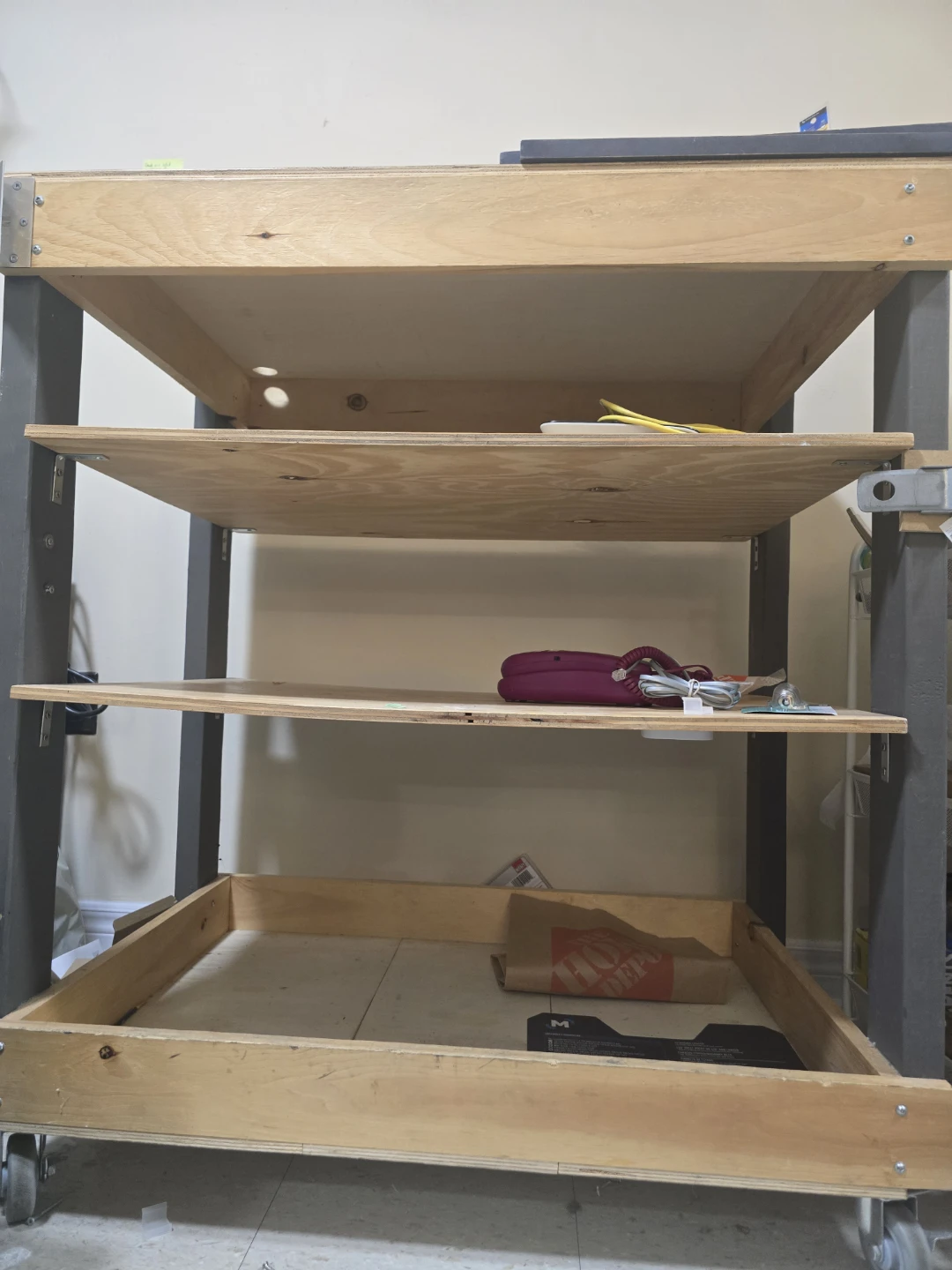 Wooden rolling utility cart with three shelves