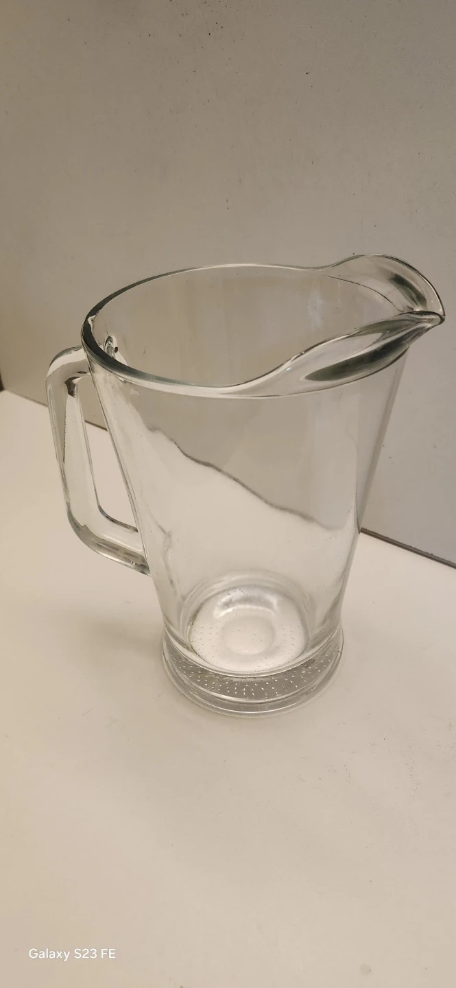Clear glass beverage pitcher
