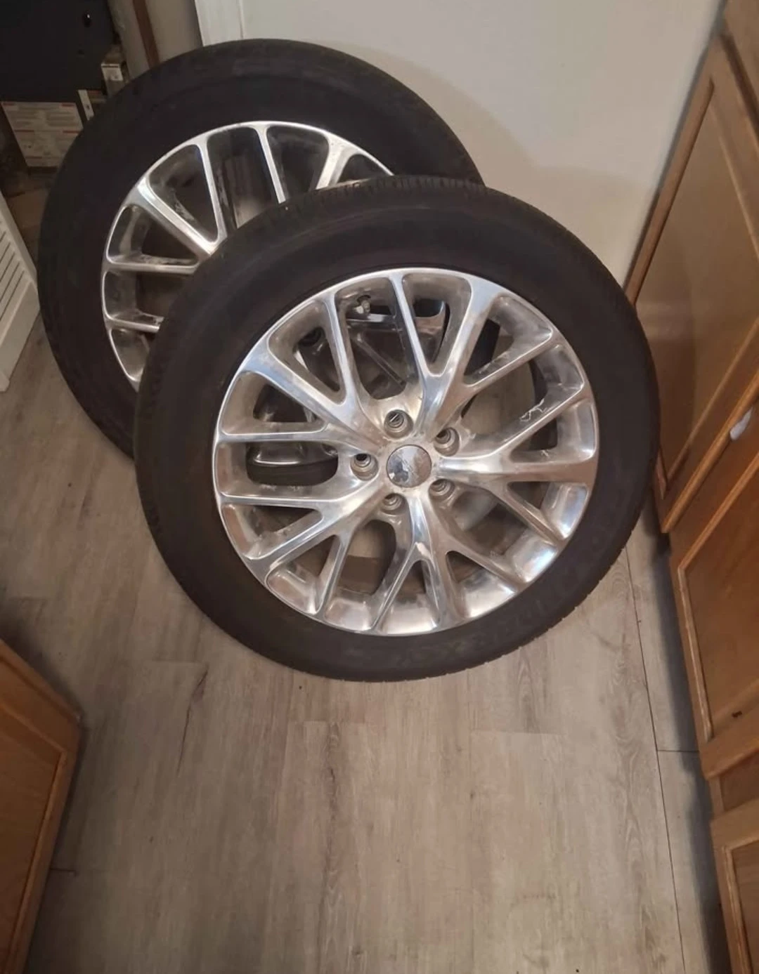 Chrome-finished multi-spoke wheels with tires. P255/50. 20 inch.