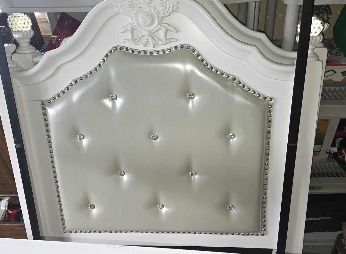 Two White Tufted Twin Beds