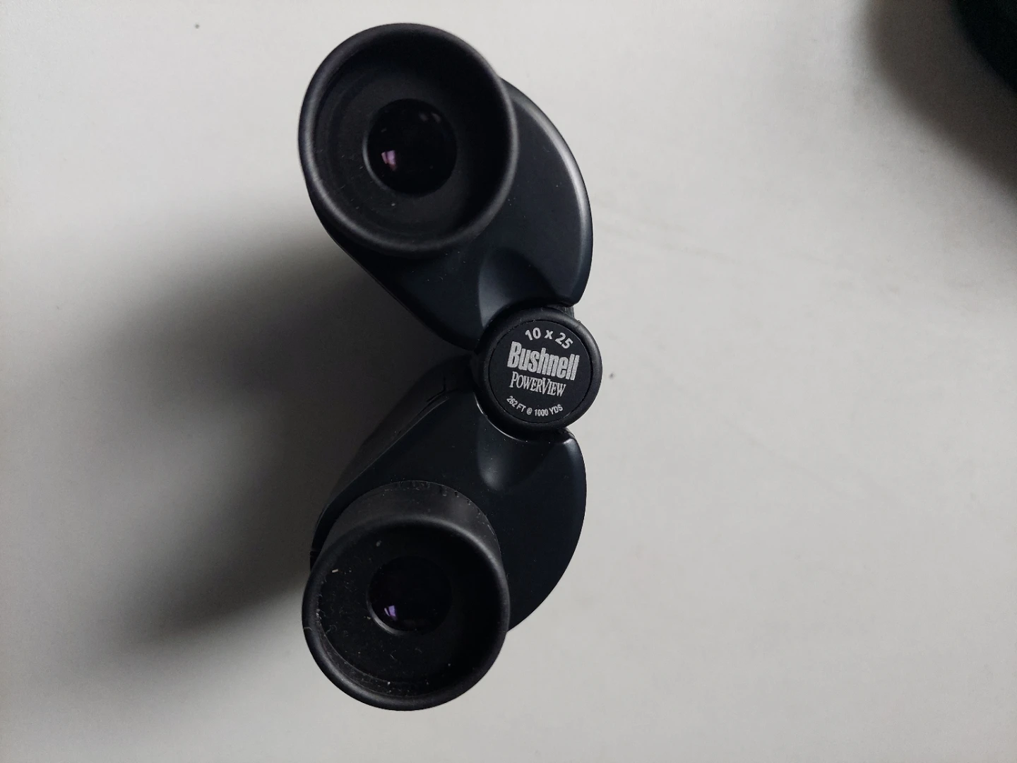 Bushnell PowerView 10x25 Binoculars - photo 2