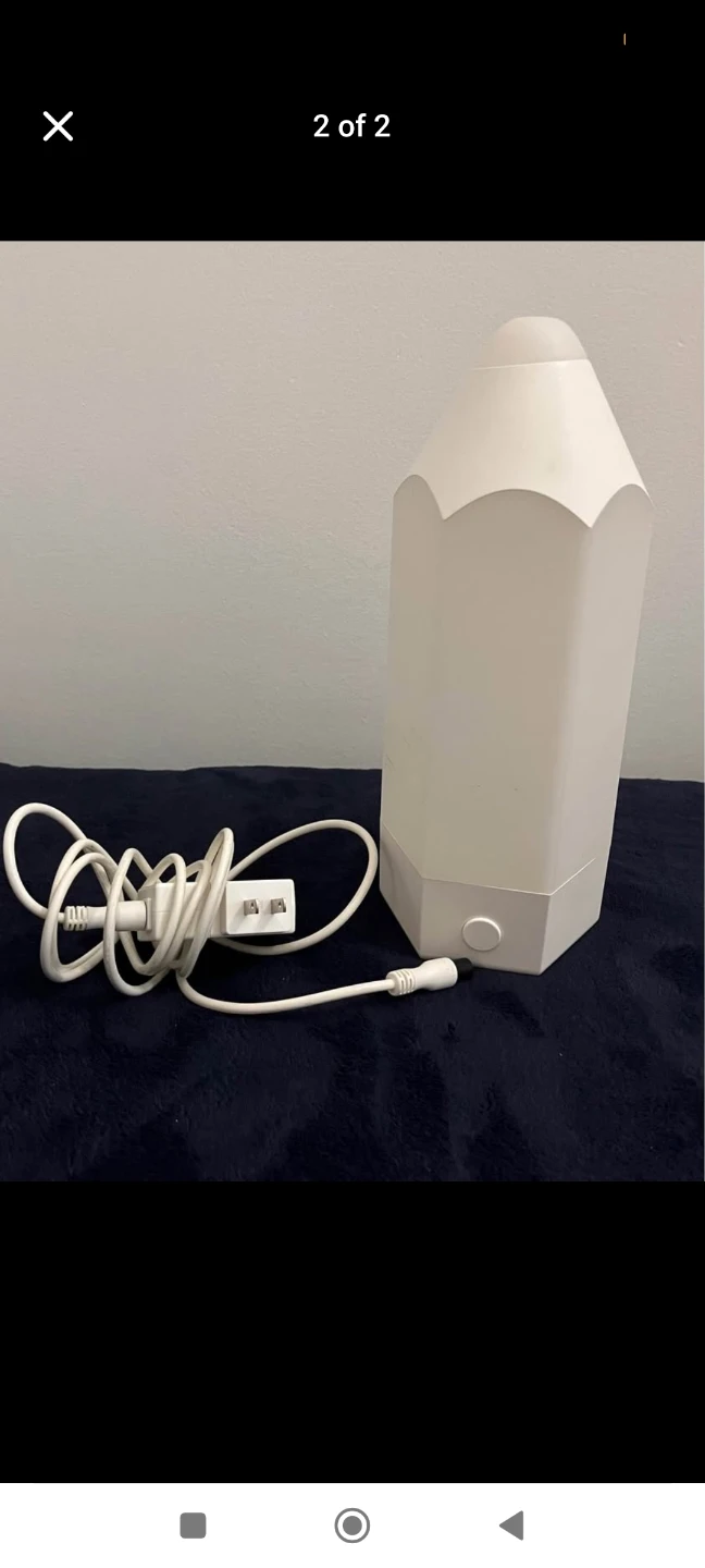 White Pencil Shaped lamp changes colours