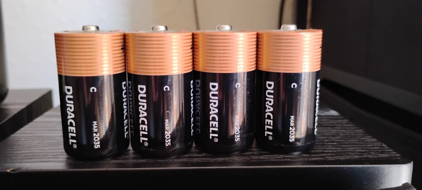 Four Duracell C Batteries