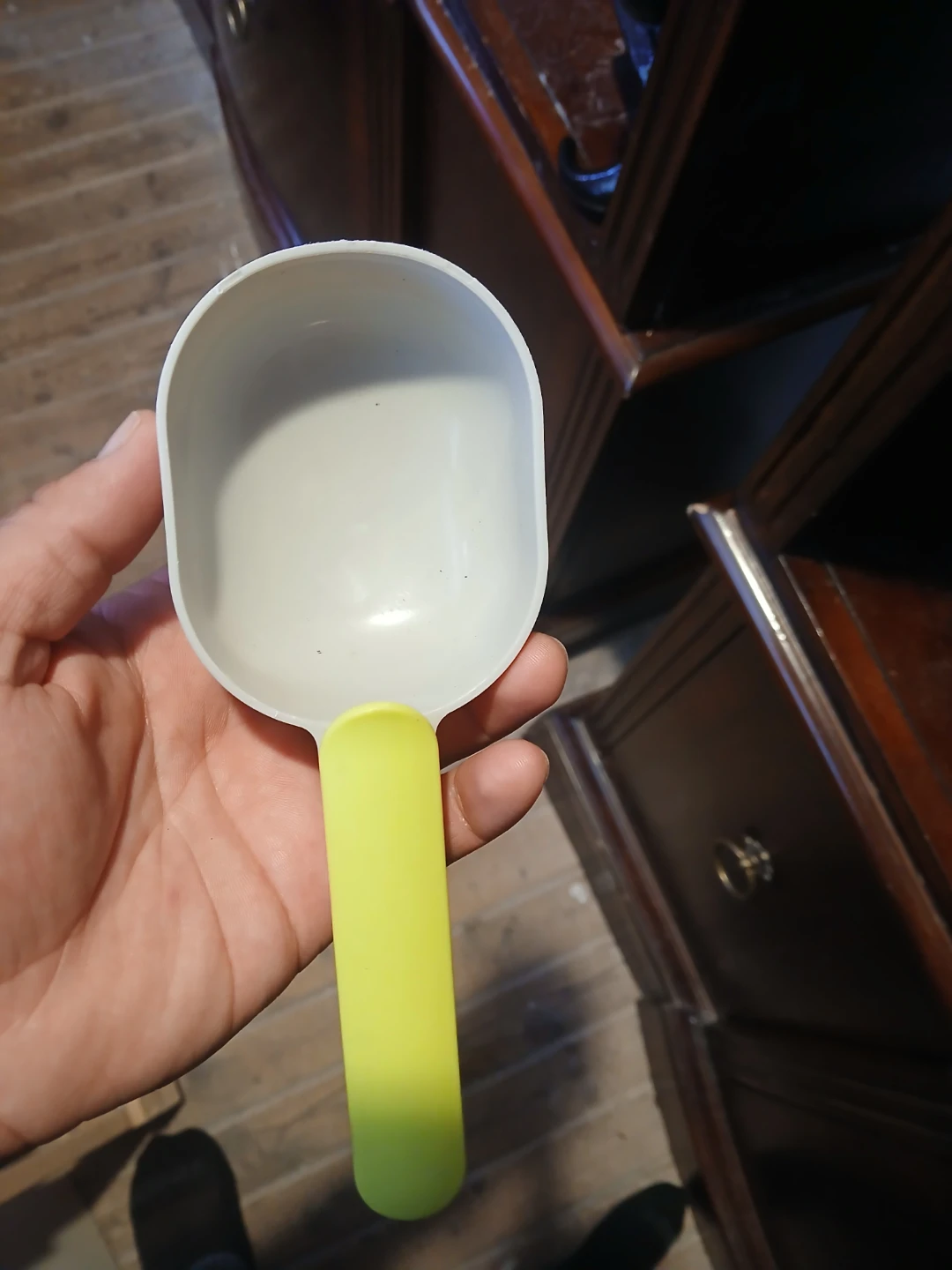 White plastic kitchen scoop