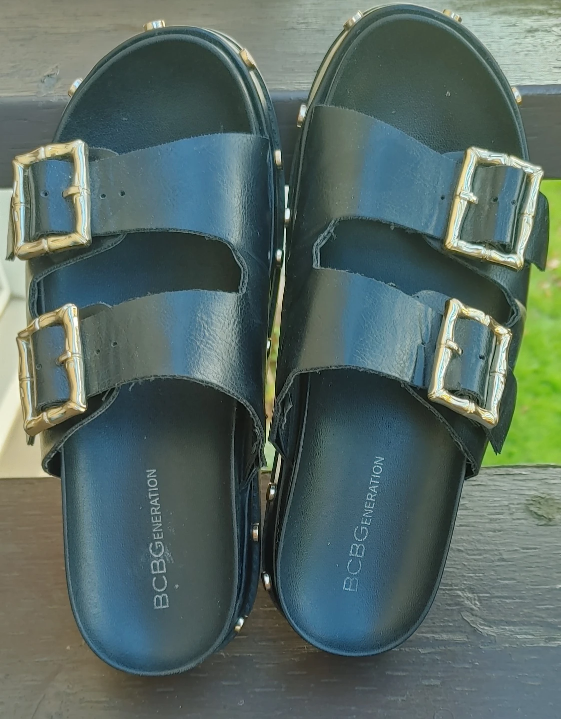 BCBGeneration black sandals with gold buckles