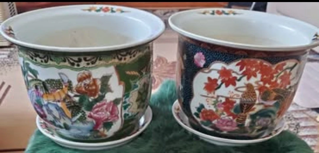 Two Ornate Ceramic Planters with Saucers