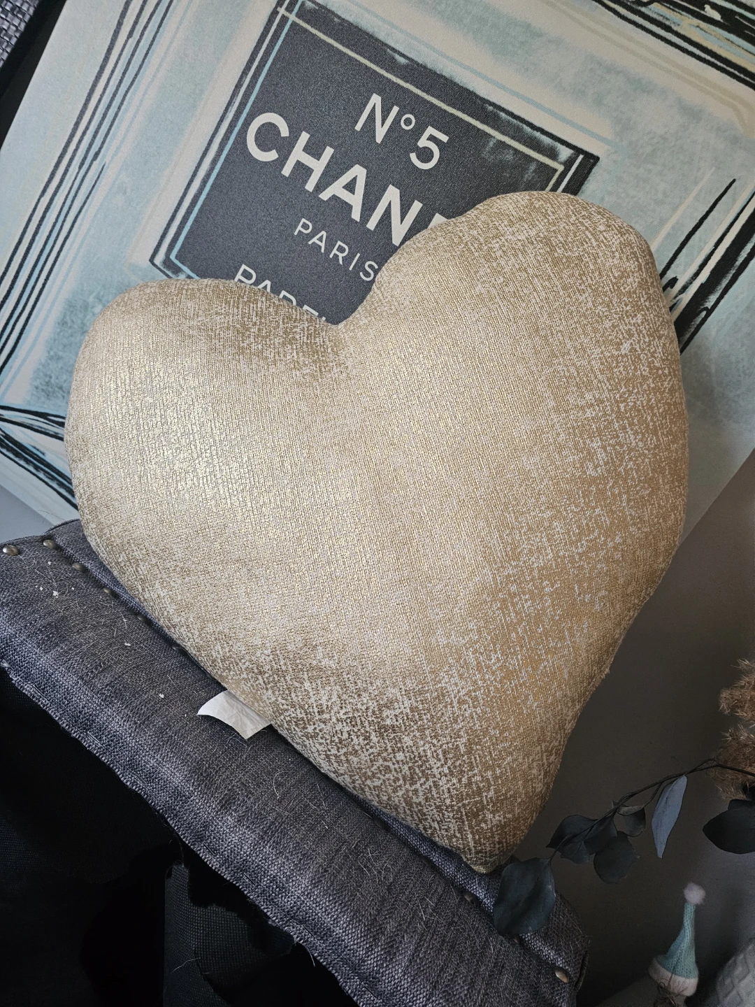 Gold heart-shaped decorative cushion