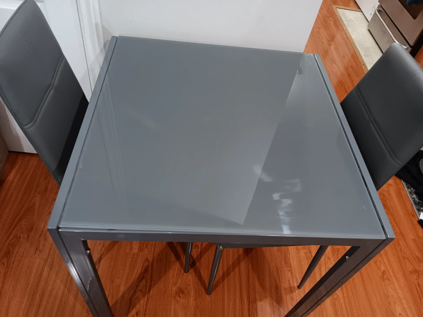 Grey glass top dining table  set