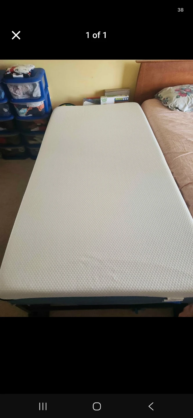 Twin size memory foam mattress and black frame