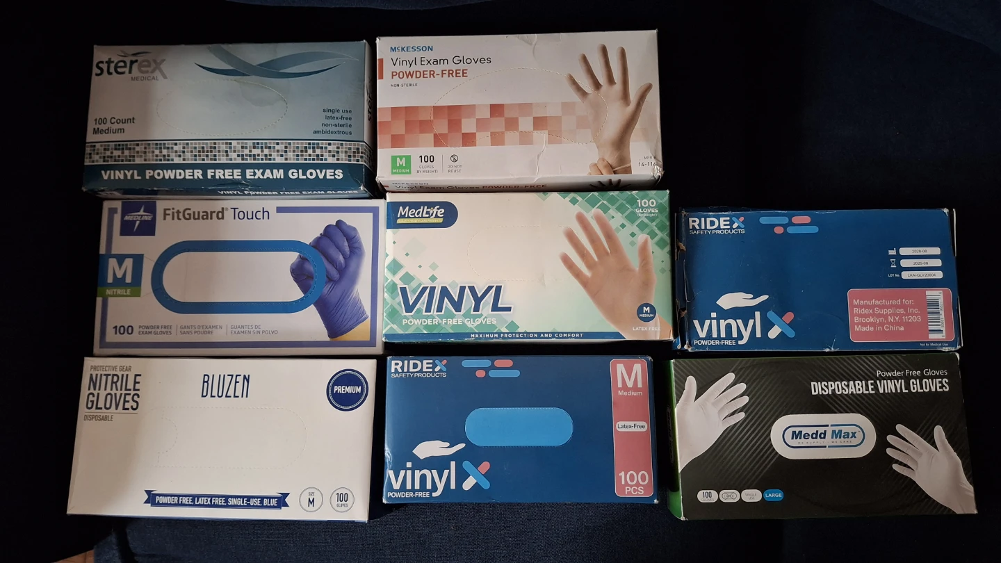 NEW 8 boxes of Vinyl gloves - Size Medium