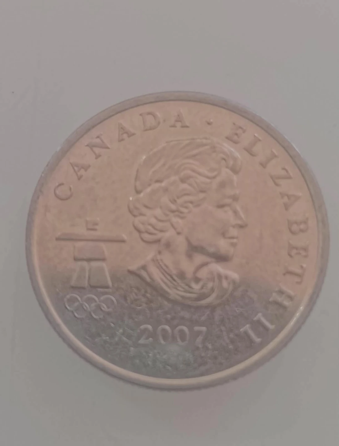 2010 Vancouver Olympic 25 Cent Coin - photo 2