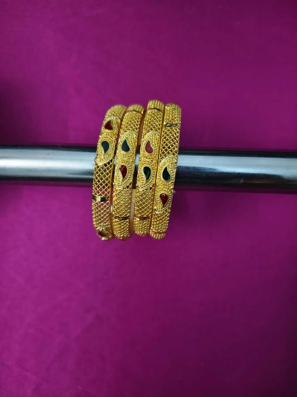 Set of 4 Gold-Tone Bangles with Enamel Details