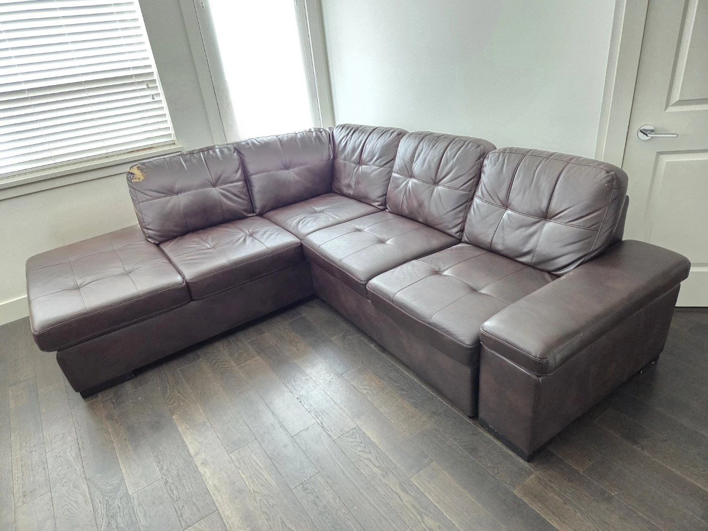 brown faux leather pull-out sleeper sectional with storage
