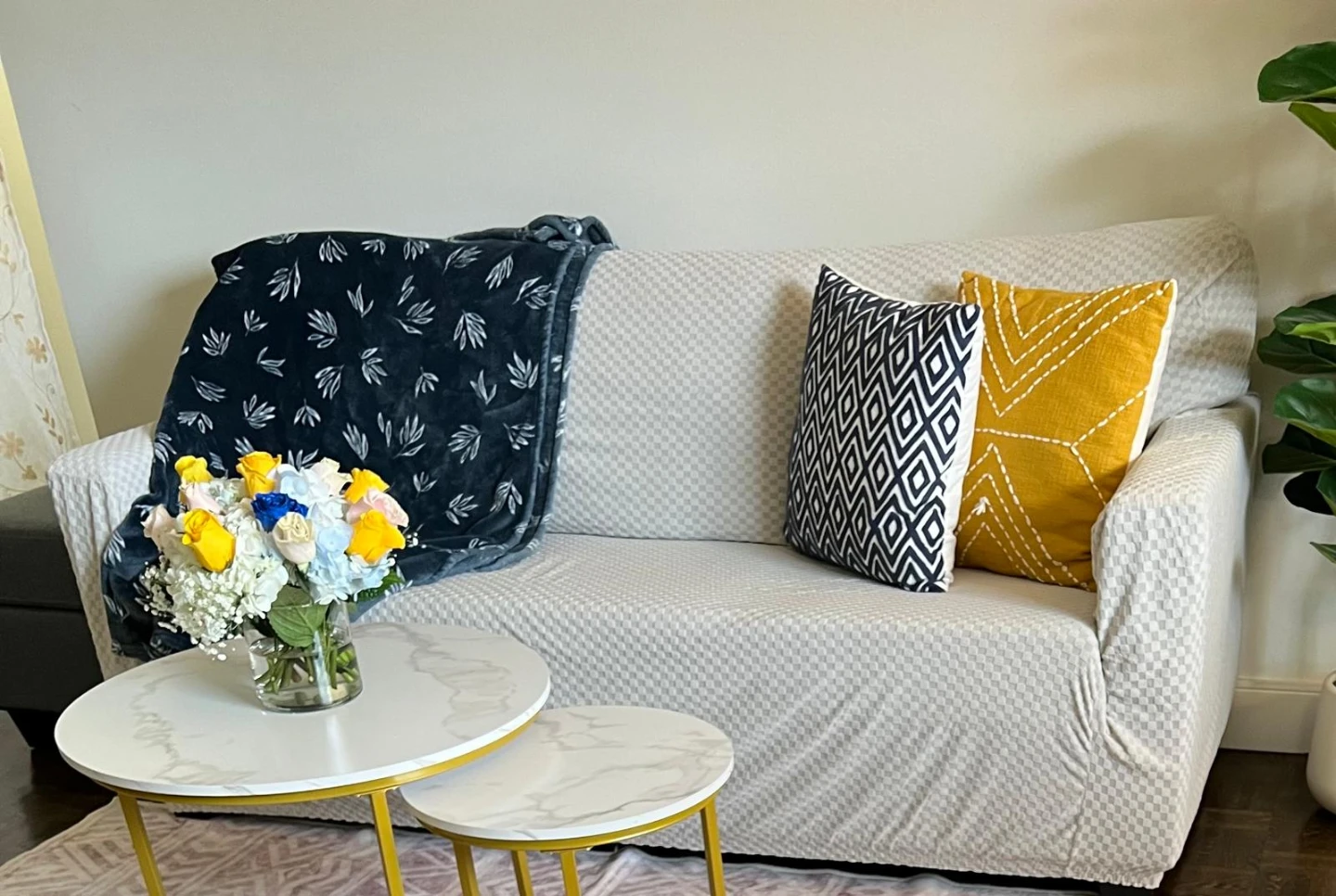 Grey fabric sofa with ottoman
