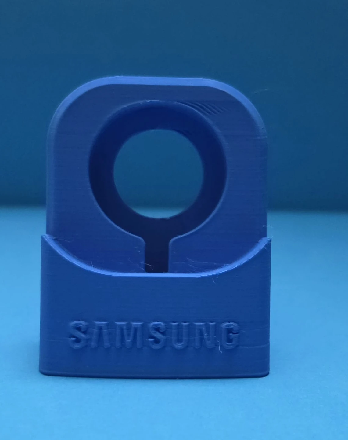 Blue Samsung watch charging stand
