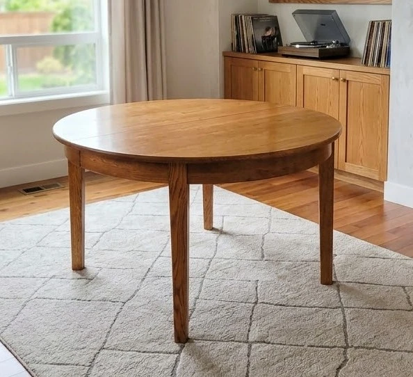 Beautiful Solid Oak Round Dining Table with 2 Extension Leaves