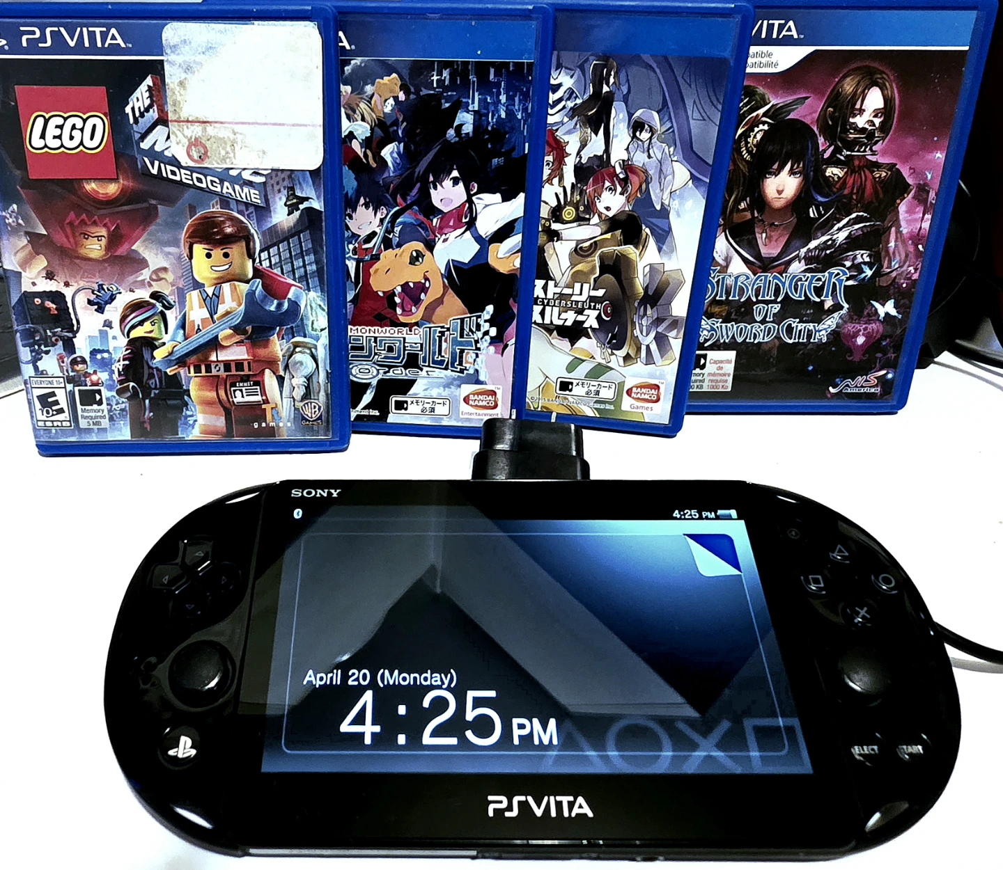 Sony PlayStation Vita Console with 4 Games