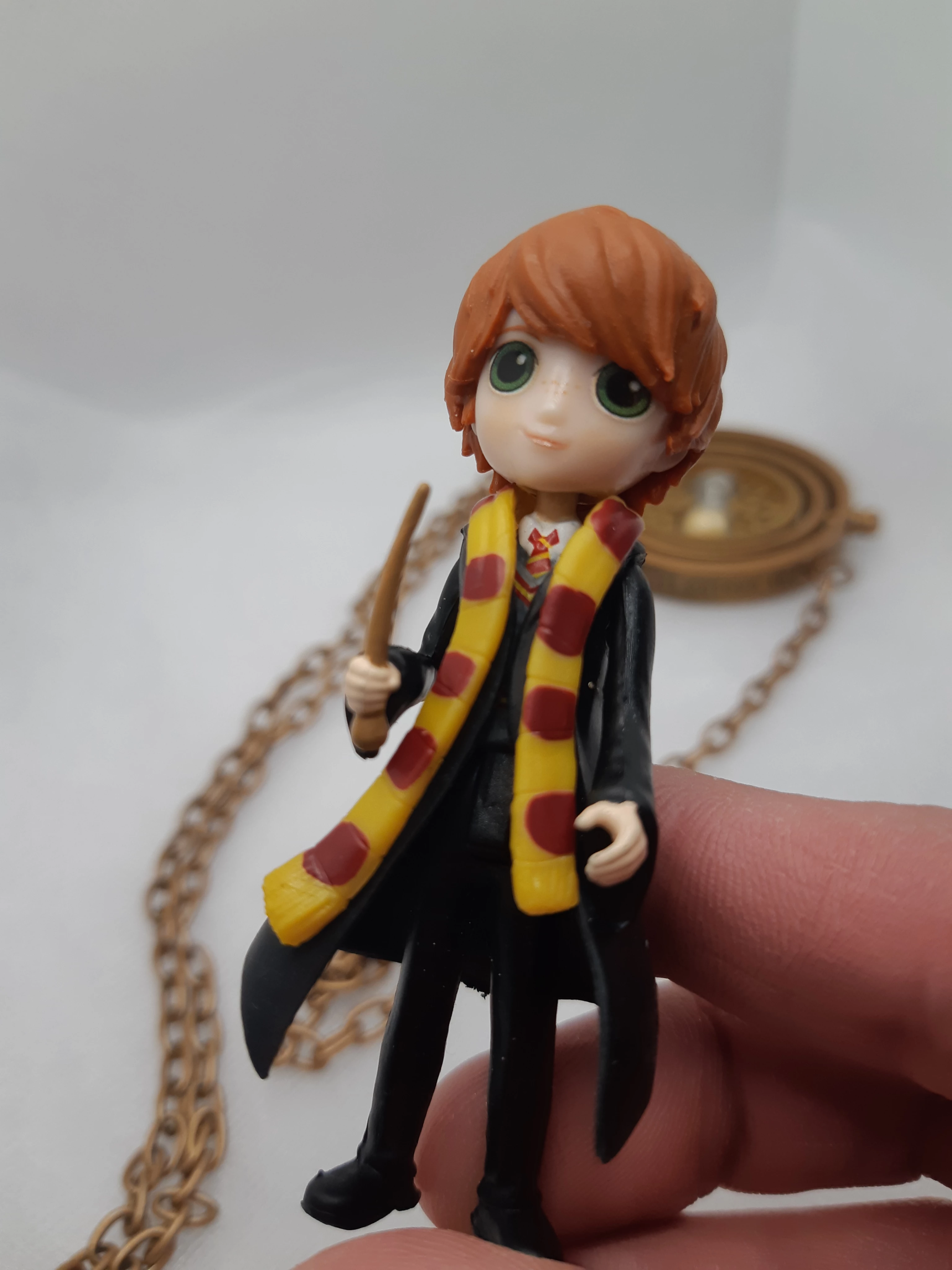 Harry Potter Time Turner necklace and Magical Mini figurine