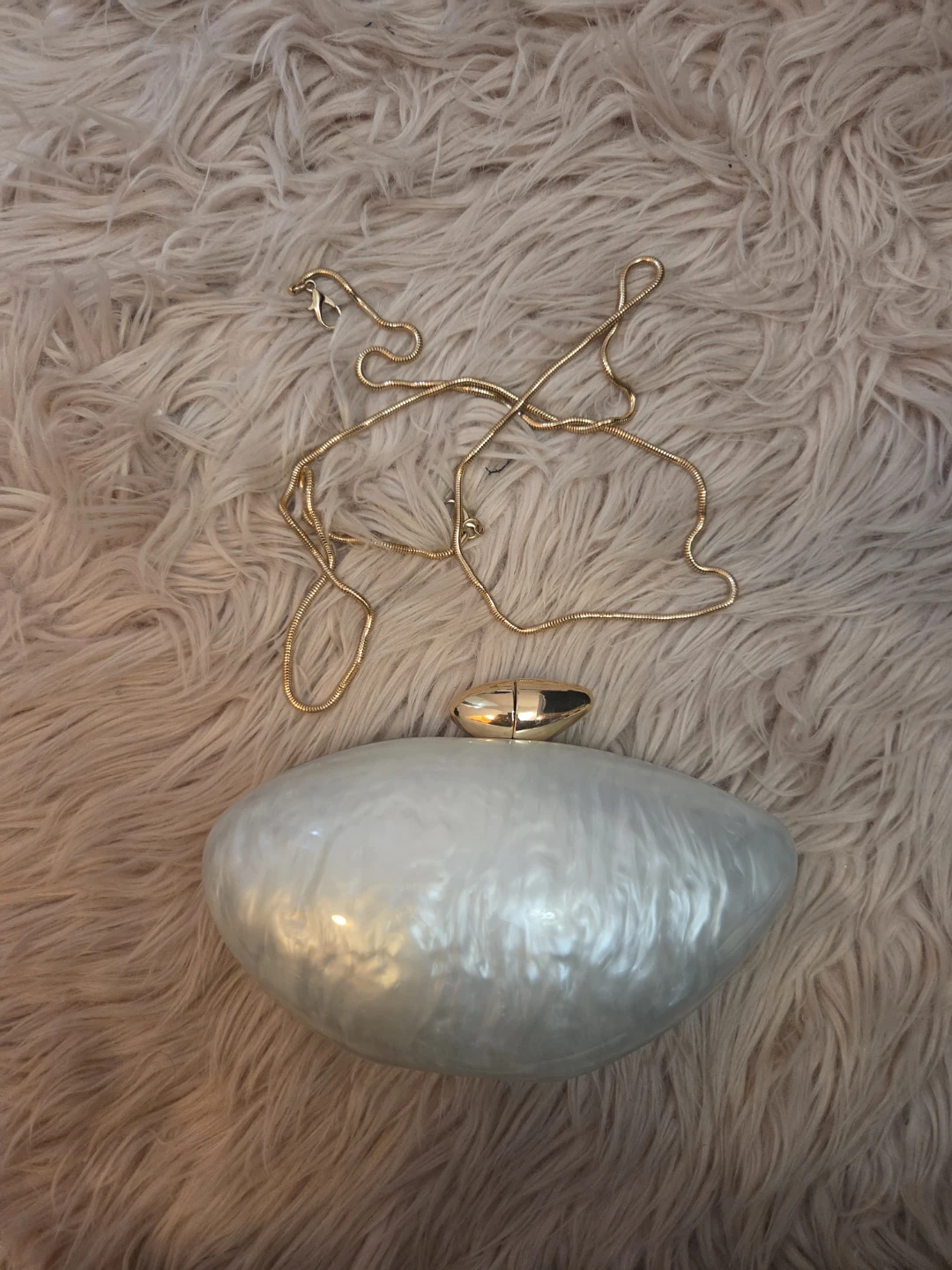Pearl-Effect Oval Clutch Bag