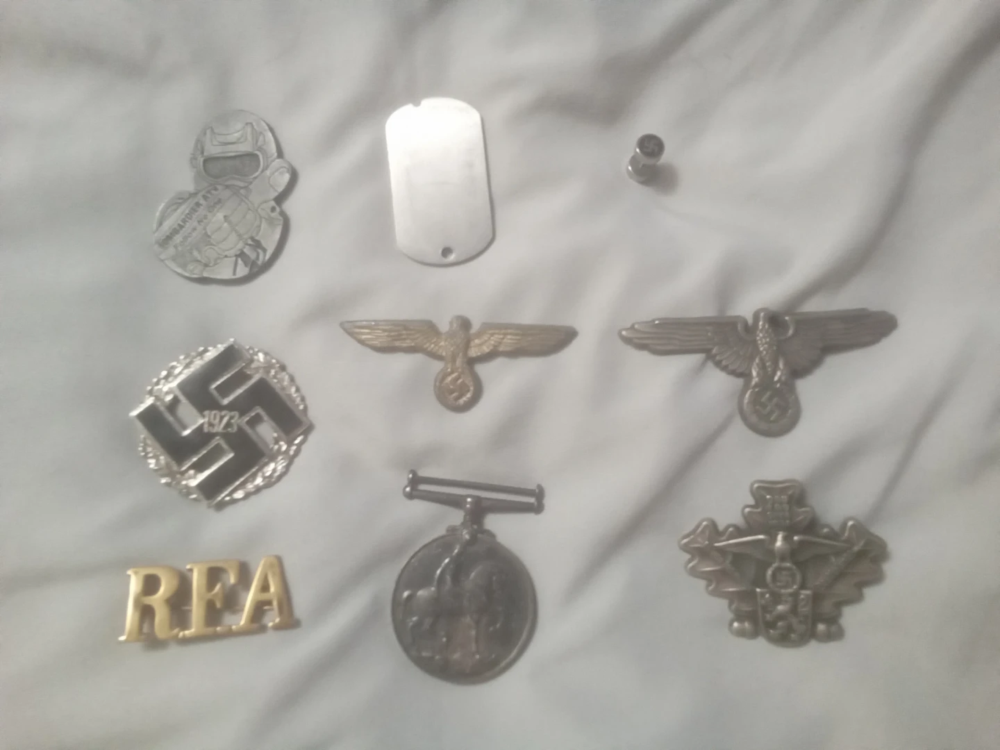 Medals pins and badges