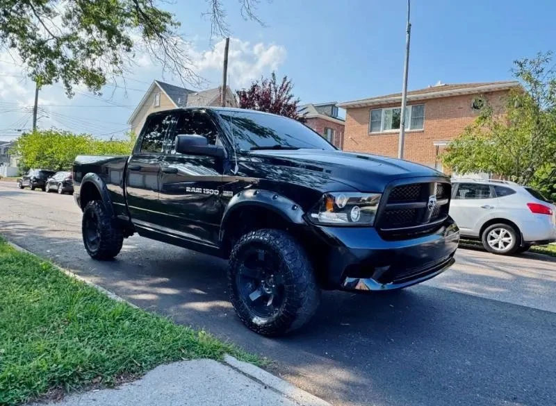 2012 RAM 1500 4 DOOR SLT HEMI AWD