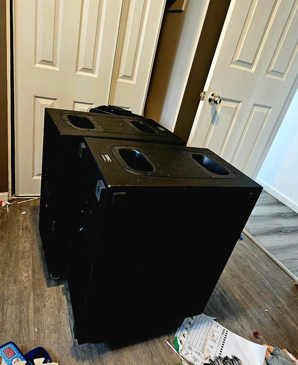 Two QSC KS212C Active Cardioid Subwoofers