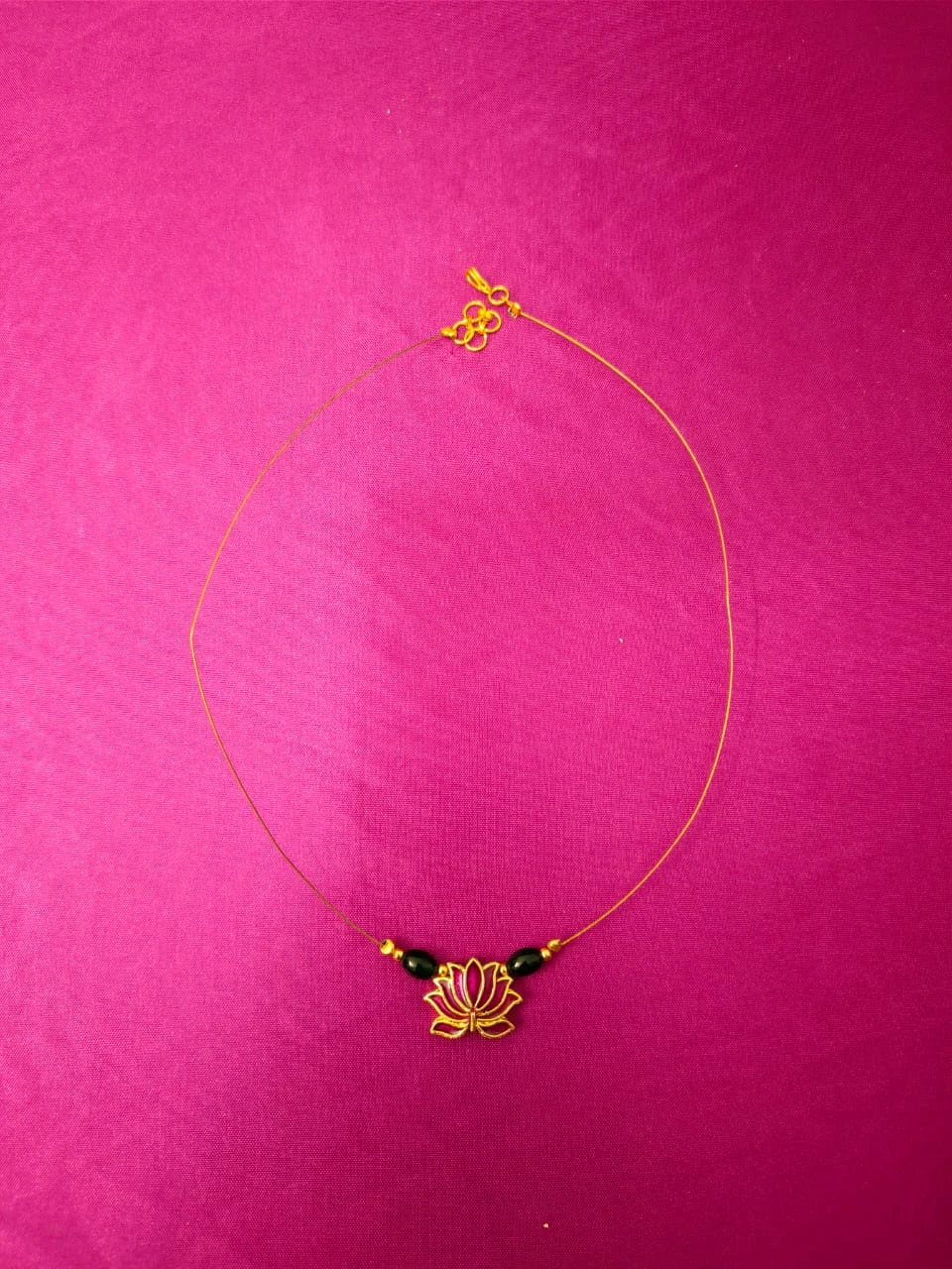 Gold-tone lotus flower necklace