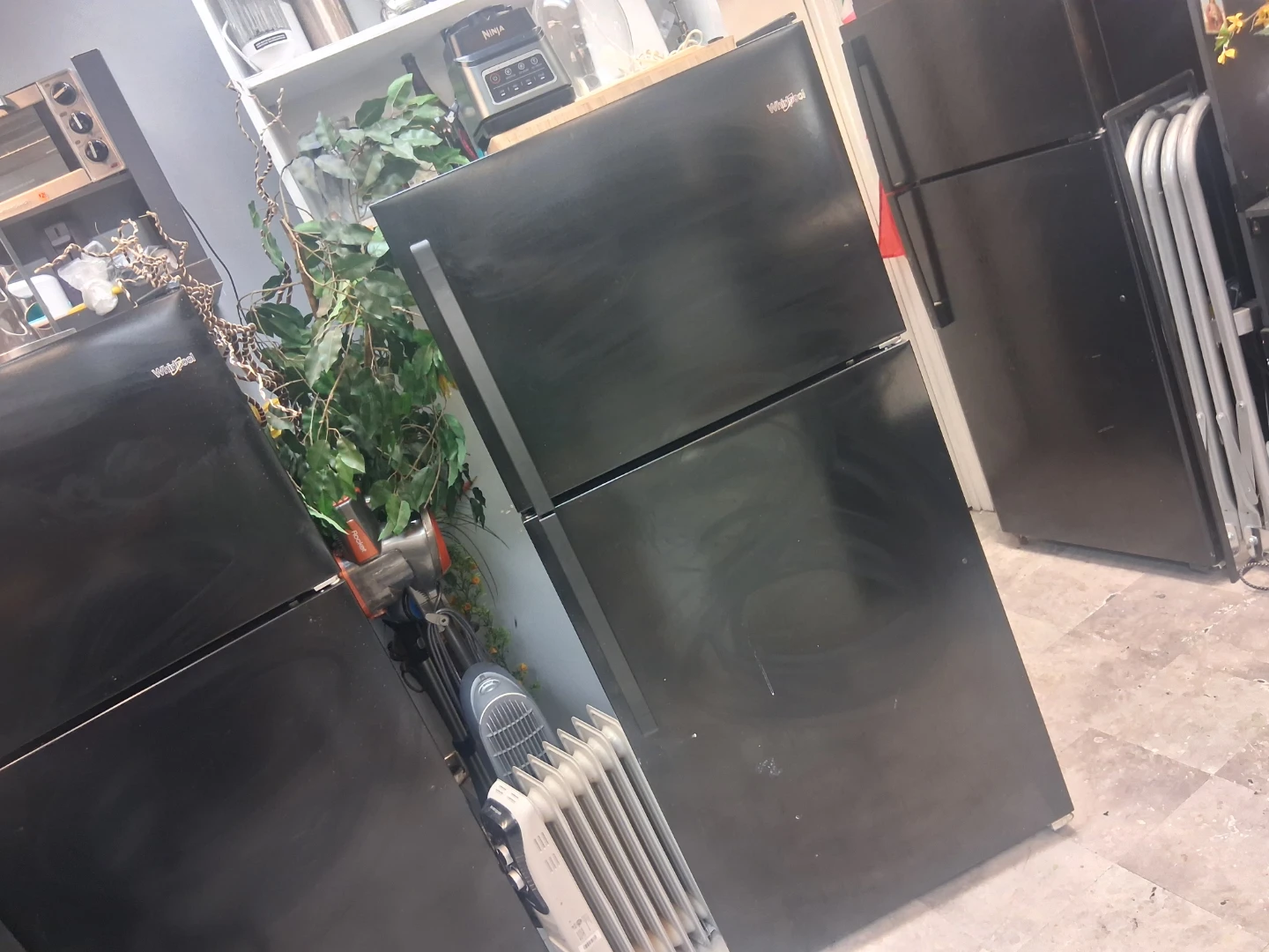 Black Whirlpool Top-Freezer Refrigerator - photo 5