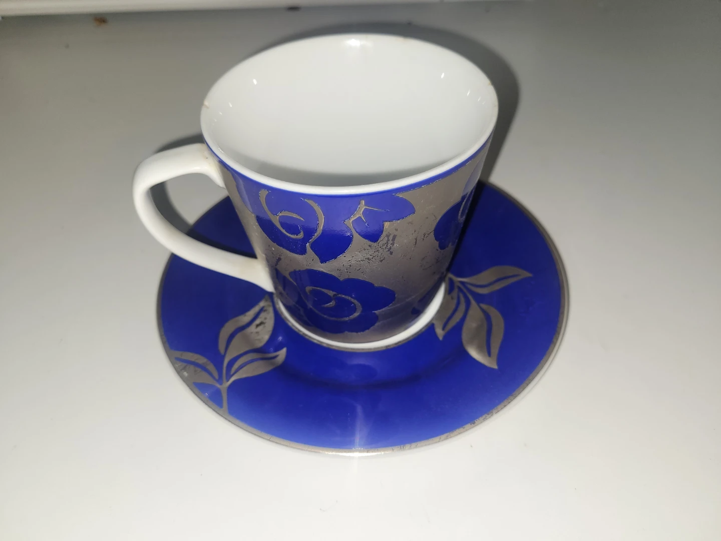 Interiors Fine Porcelain Teacup and Saucer