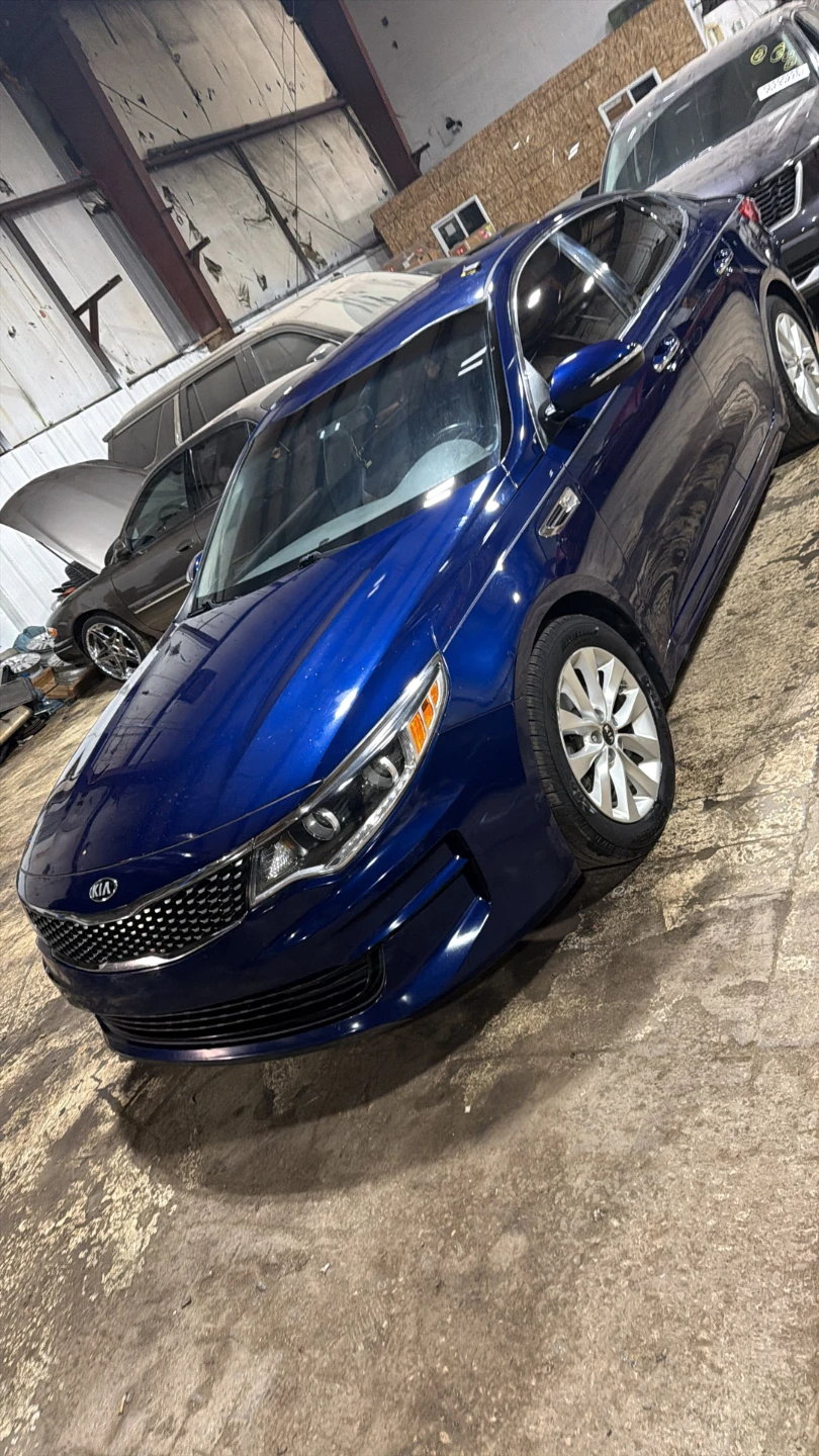 Blue Kia Optima Sedan