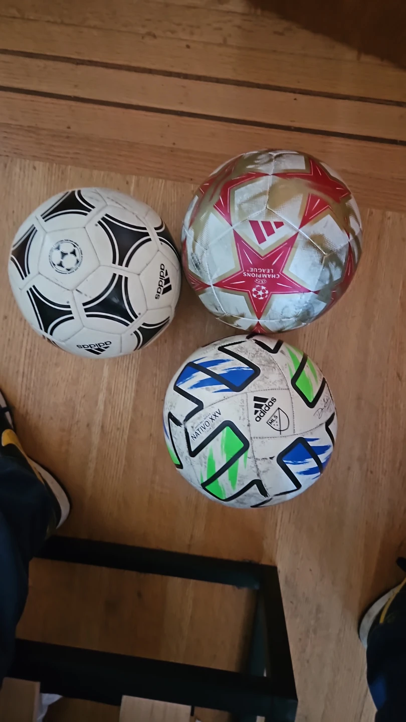Three Adidas Soccer Balls