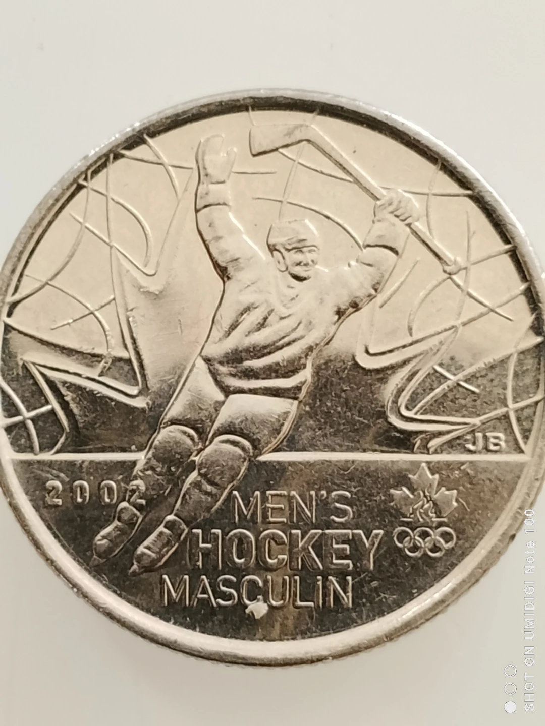 2010 Olympic Men's Hockey 25 Cent Coin - photo 2