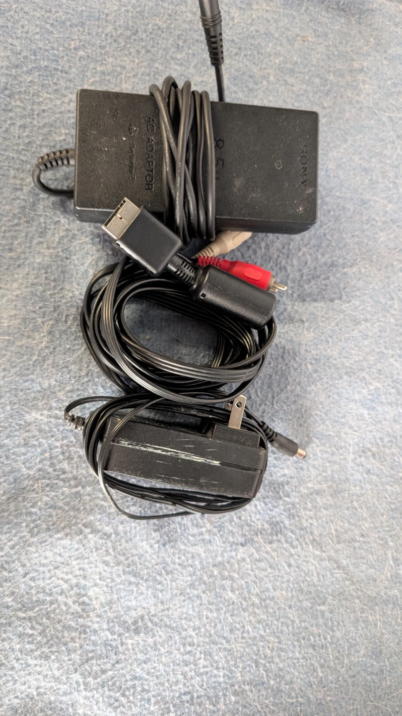 Two Sony PlayStation 2 Slim Consoles