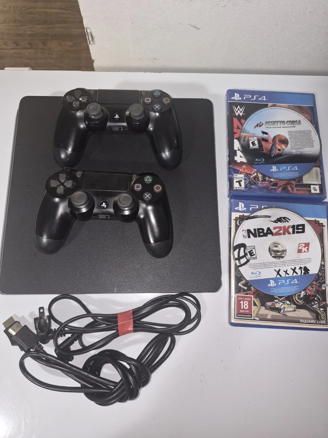 PlayStation 4 Console Bundle with 2 Controllers and 2 Games