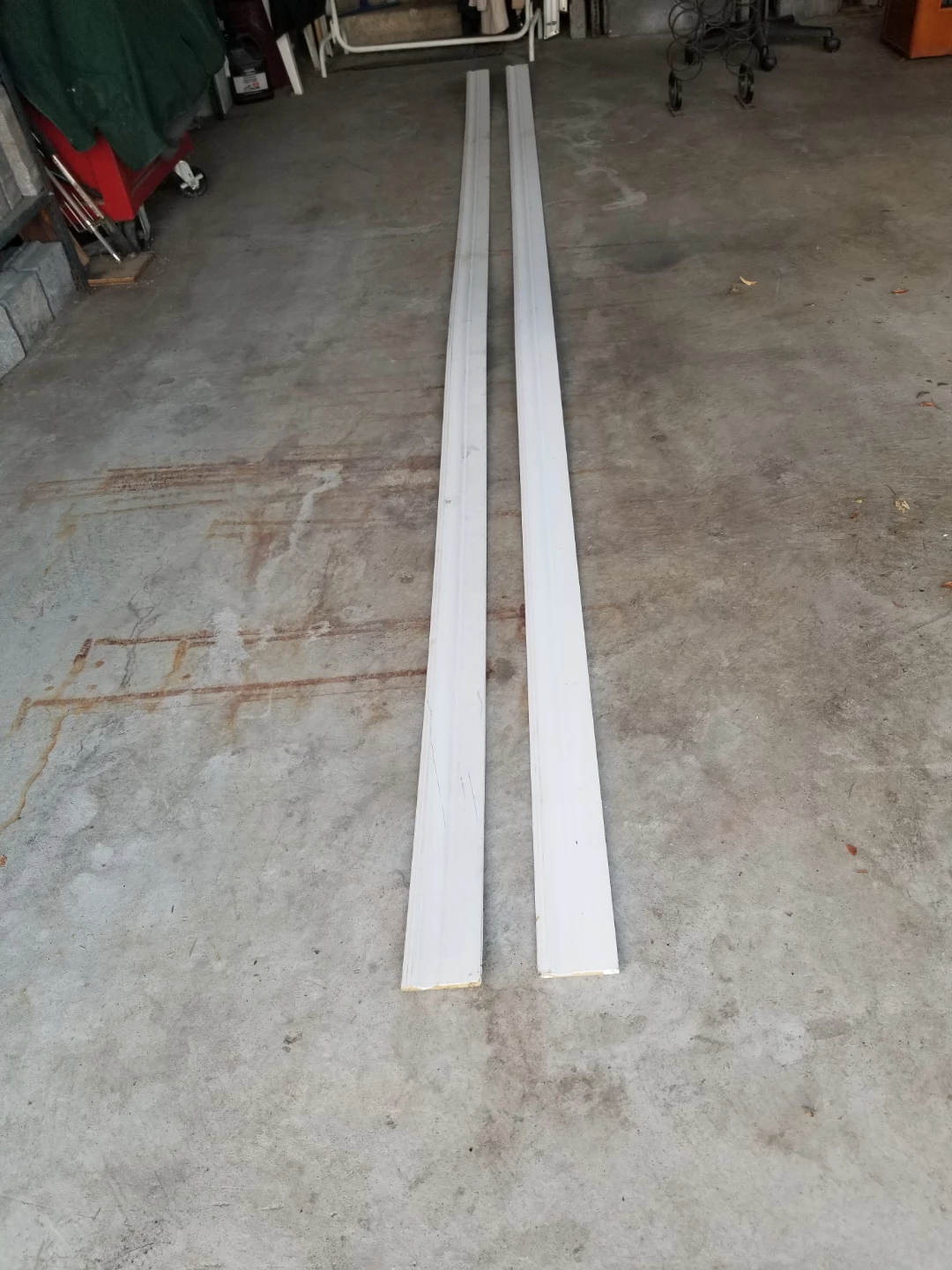 4  Pieces of White Baseboard Trim