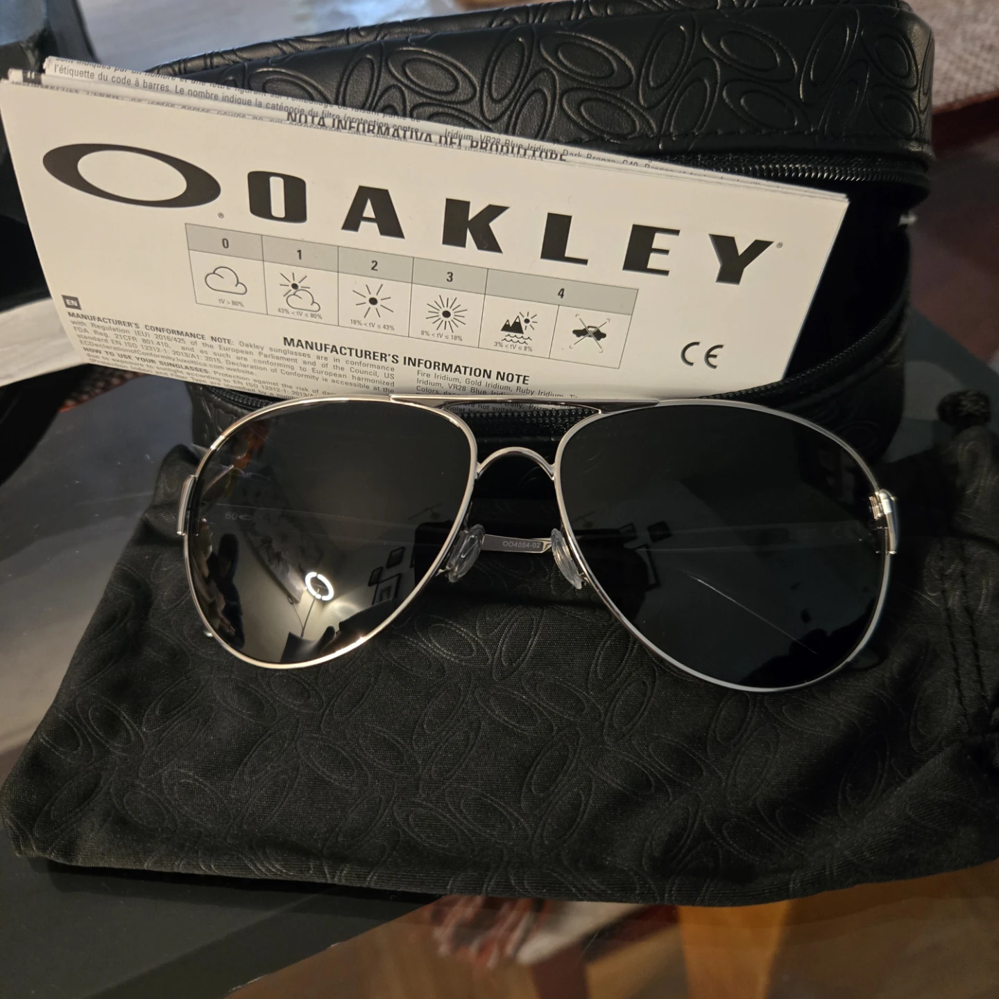 Oakley Caveat Sunglasses - Polished Chrome
