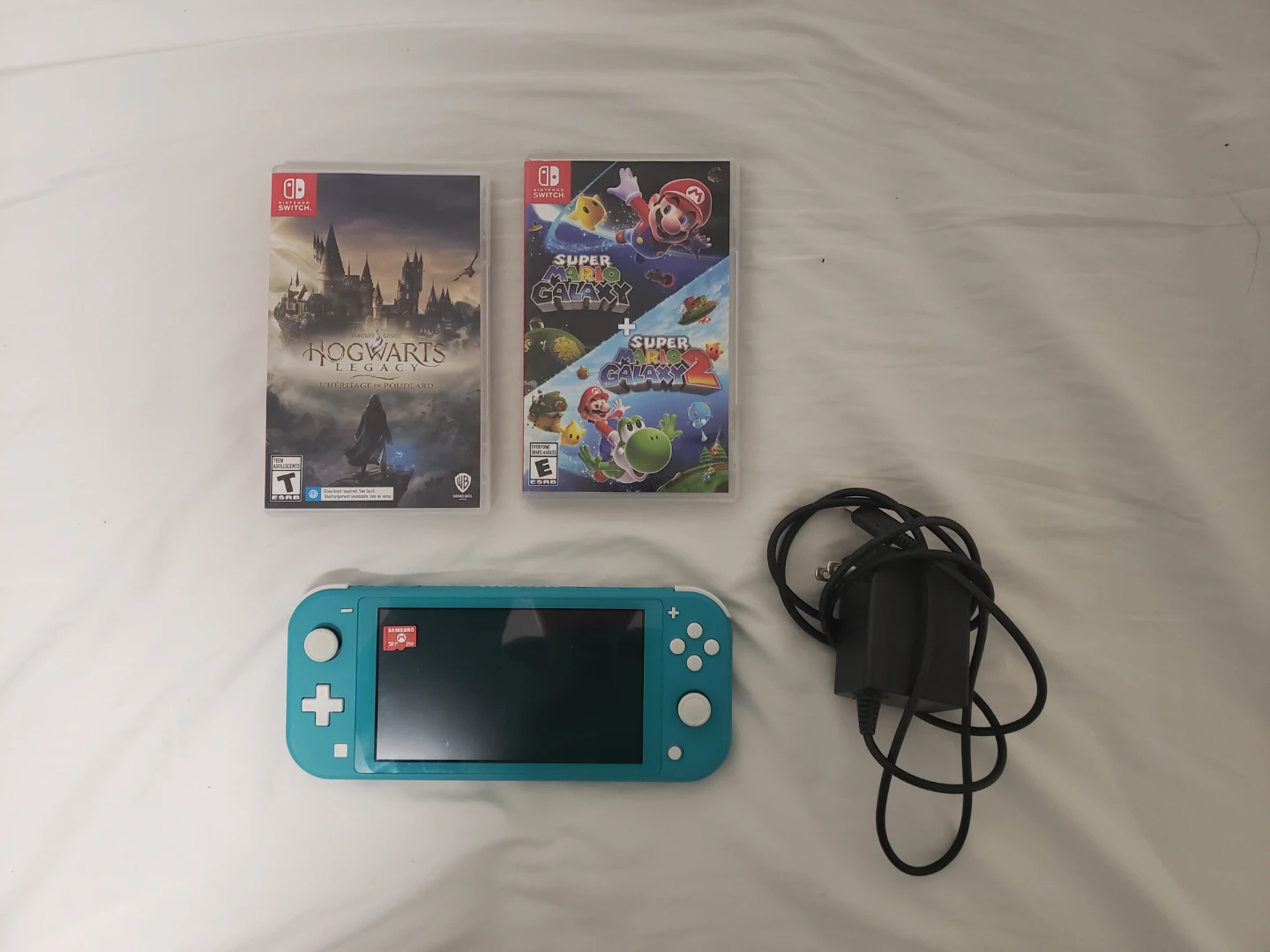 Nintendo Switch Lite + games and 256gb sd card