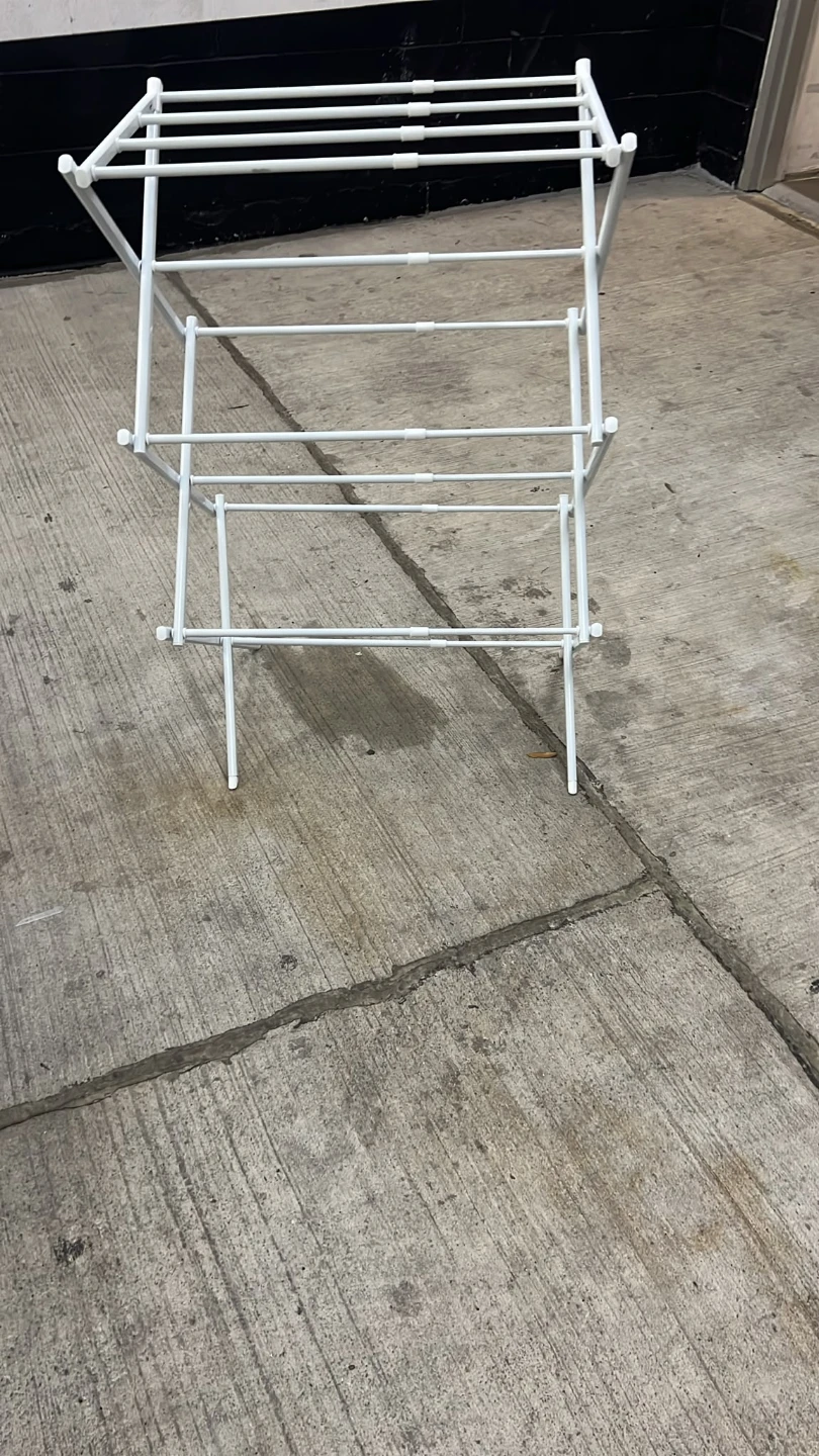 White collapsible clothes drying rack