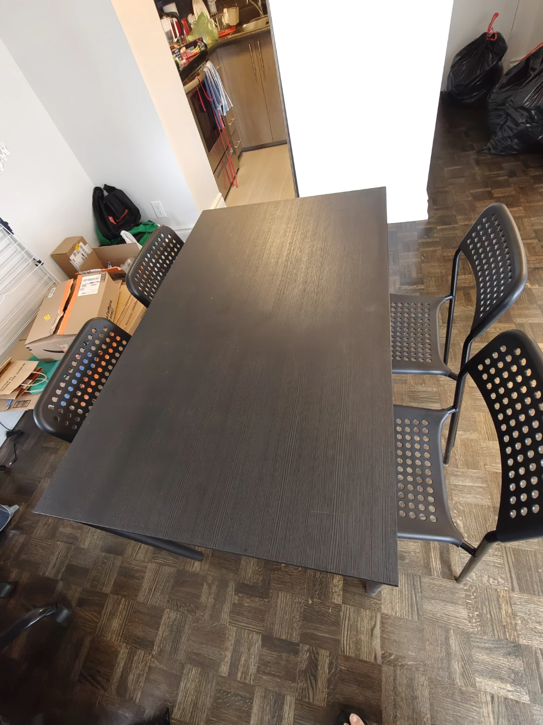 IKEA Black Dining Table with Four Chairs - photo 3