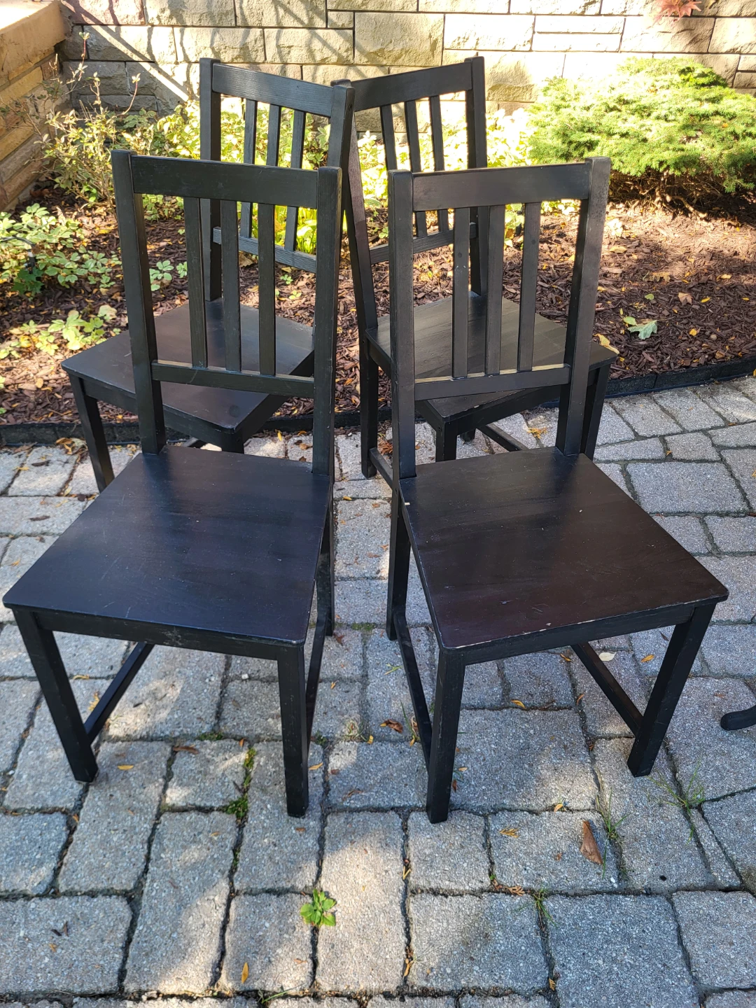 Set of 4 black wooden chairs
